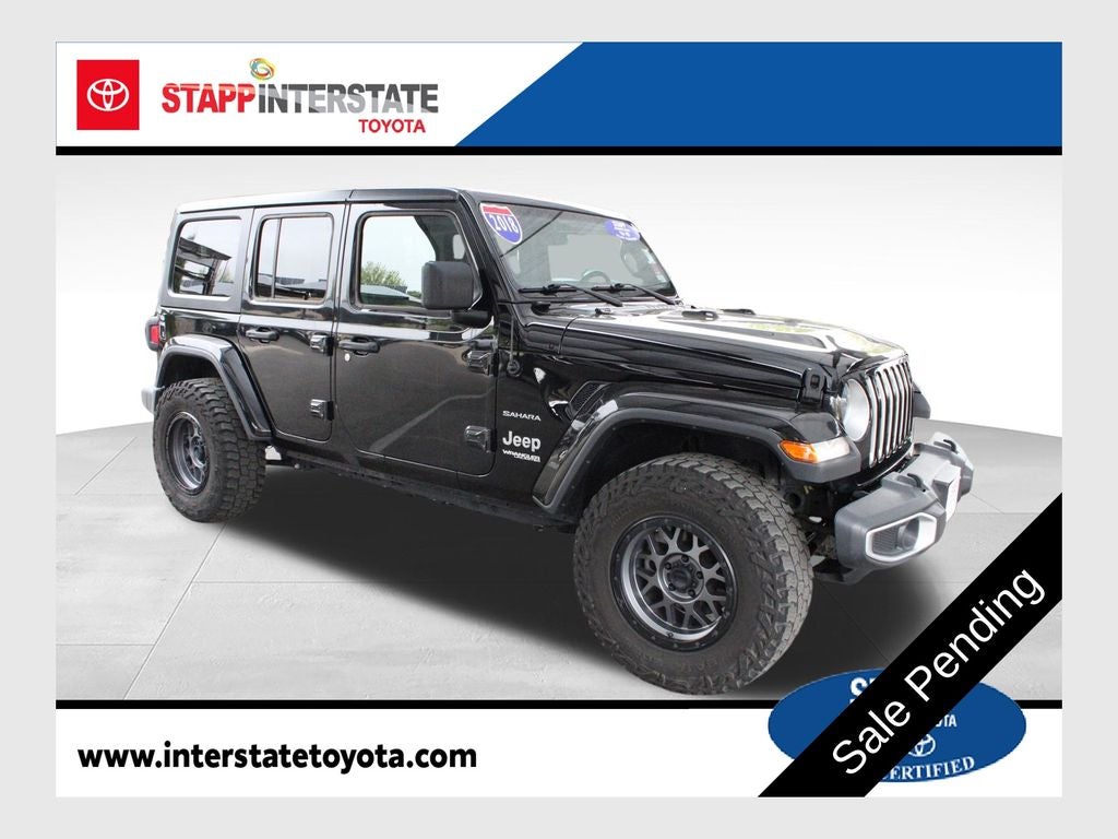 2018 Jeep Wrangler Sahara in Black Clearcoat — front three-quarter view