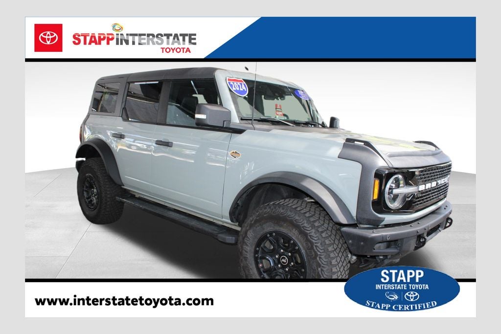 2024 Ford Bronco Wildtrak in Cactus Gray — front three-quarter view