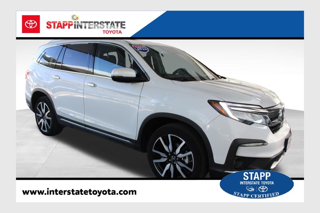 2022 Honda Pilot Touring 7 Passenger in Platinum White Pearl — front three-quarter view