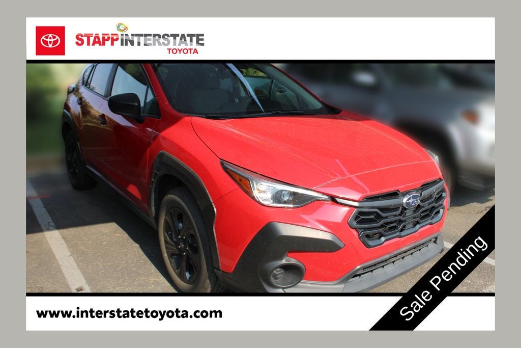 2024 Subaru Crosstrek Base in Pure Red — front three-quarter view
